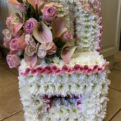 Vacant pink and white chair