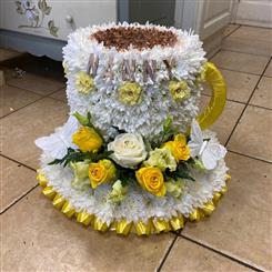 Yellow and white Cup and saucer 