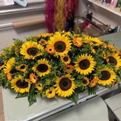 Sunflower coffin spray