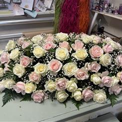Pink and white rose and gyp coffin spray 